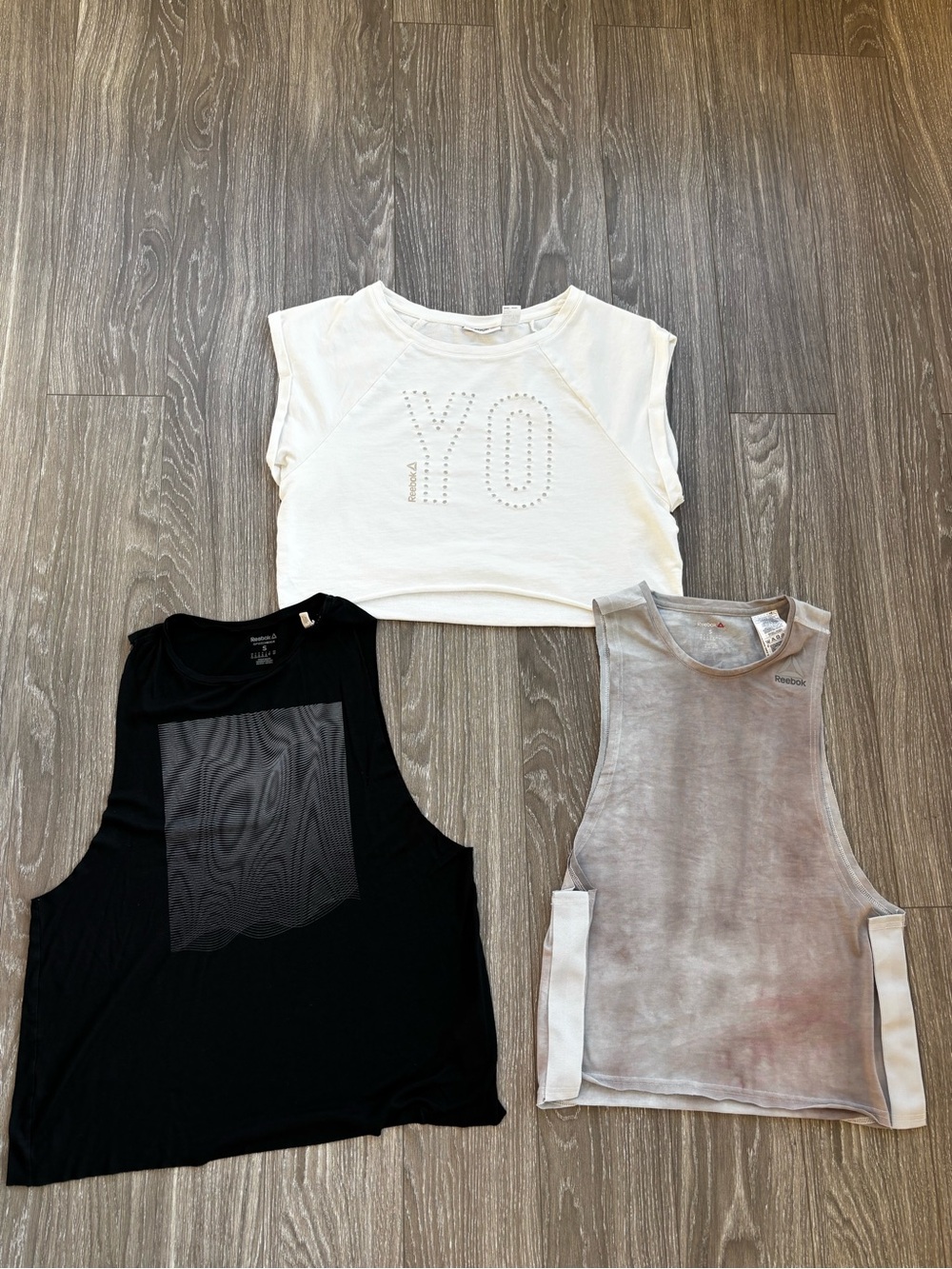 Bundle of Reebok White Studded Cropped Muscle Tee with Black and Gray Tanks